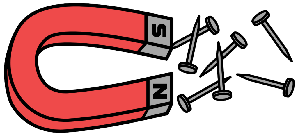 Magnet attracting iron nails to demonstrate magnetic potential energy.